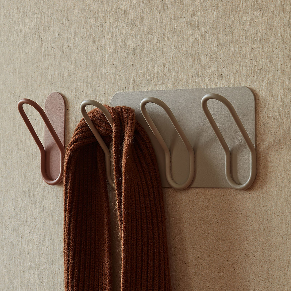 http://munken.co/cdn/shop/products/blush-cream-no-drill-wall-hook_1200x1200.jpg?v=1639646579